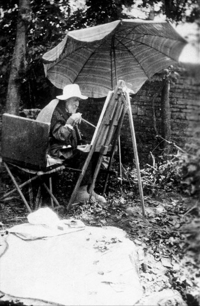 Pierre Auguste Renoir painting with two hands, c. 1916-17 by Unknown